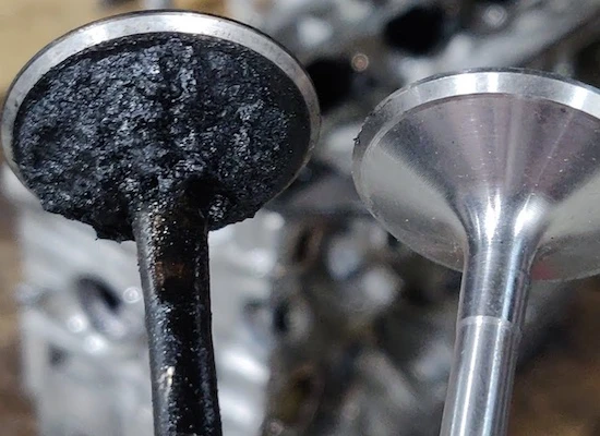 audi inntake valve carbon buildup being replaced with a new intake valve